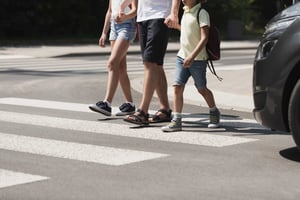 Crossing road with child