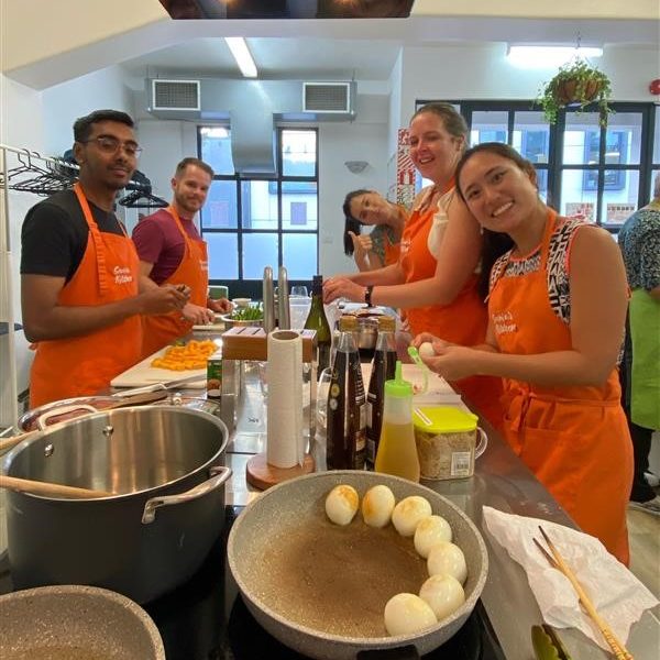 Social Auckland team cooking by Abley staff.