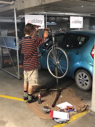 A person fixing their bike