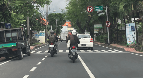 Asia motorcycles crossing