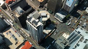 Aerial view of city showing buildings and traffic