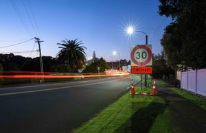 Sign on side of road